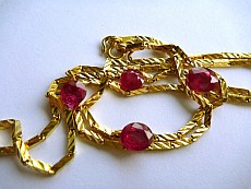 Ruby rounds with gold